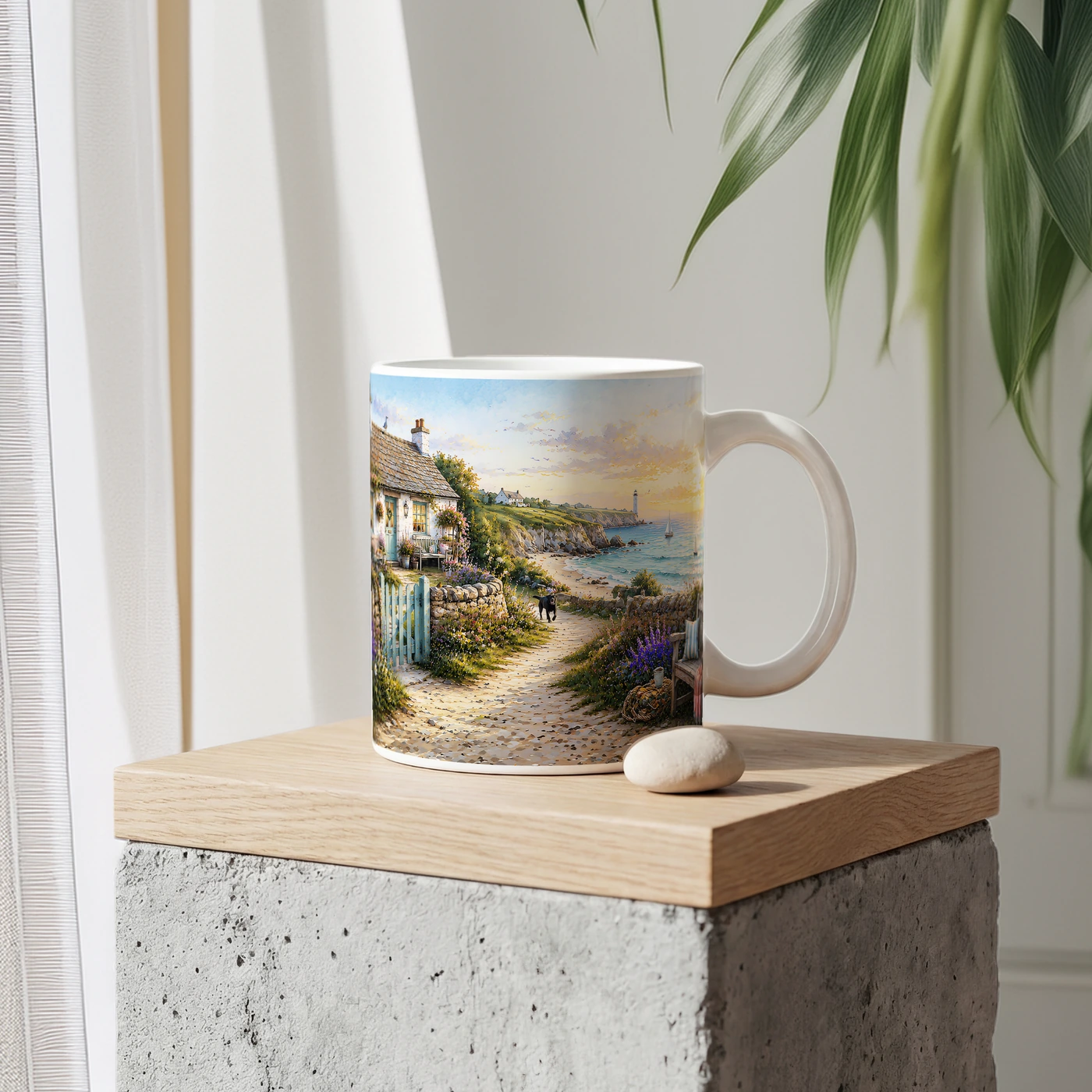 A peaceful coastal cottage scene printed on a mug